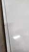 SZÉPSÉGHIBÁS Hager Univers FW424WT Fém mezős elosztó, 96 modul, 4 sor, 791x571x150mm, teli ajtóval, IP30, falon kívüli, Univers (Hager FW424WT)